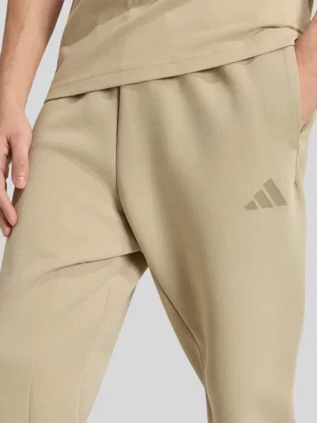Spodnie dresowe o kroju regular fit z tunelem Adidas Sportswear