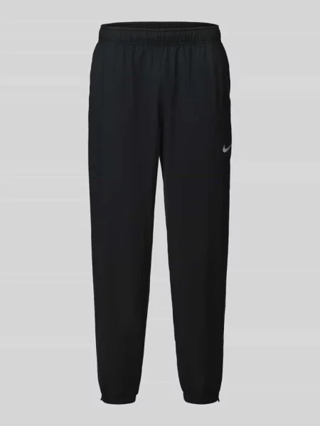 Spodnie dresowe o kroju regular fit z nadruk z logo model FORM' Nike Training czarne