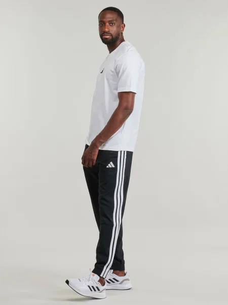 Pruhované jogger nohavice Adidas čierna