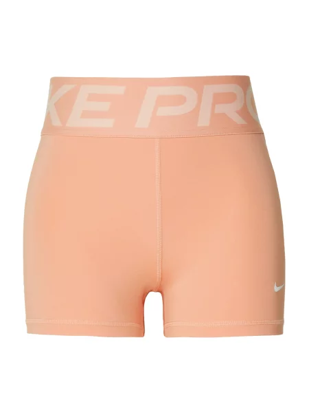 NIKE Športové nohavice marhuľová biela