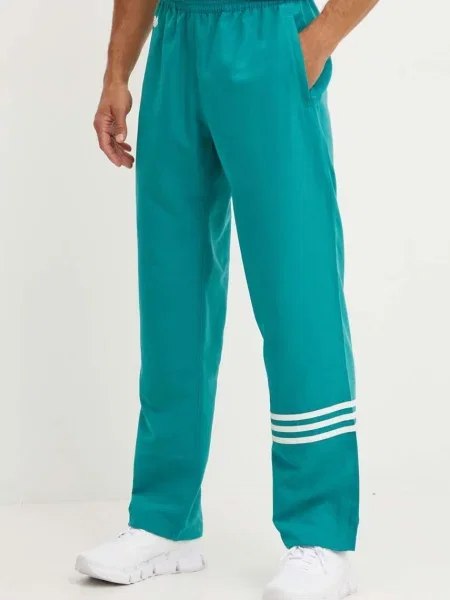 Спортен панталон adidas Originals тюркоазено с апликация