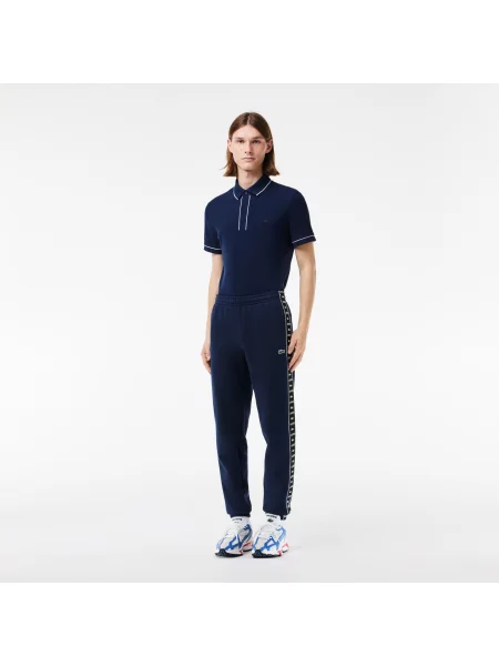 Lacoste Spodnie Dresowe O Zwężanym Kroju Z Nadrukiem granatowy