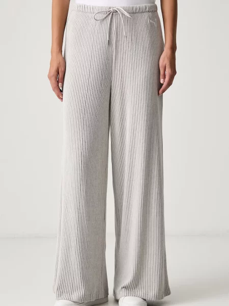 Puma pantaloni de trening pentru femei cu vâscoză Essentials Ribbed bej
