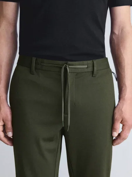 Spodnie slim fit comfort Thermolite® ciemnozielony Mężczyzna 42 MANGO MAN