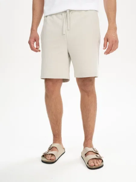 MELA Pantaloni Krish kitt alb