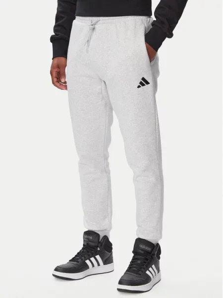 Teplákové kalhoty adidas šedé