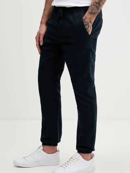 Hlače Tommy Jeans mornarsko modra