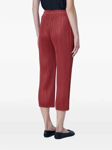 Oříznuté kalhoty Pleats Please Issey Miyake červené