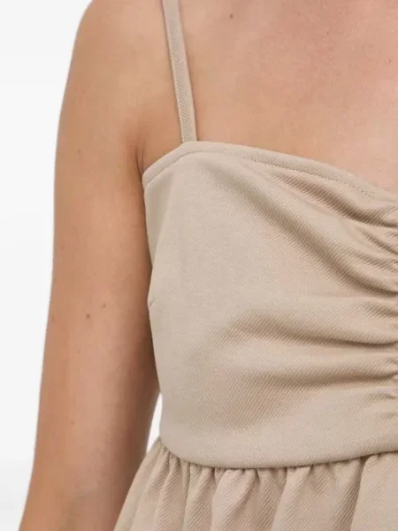 Cu peplum top Notes Du Nord