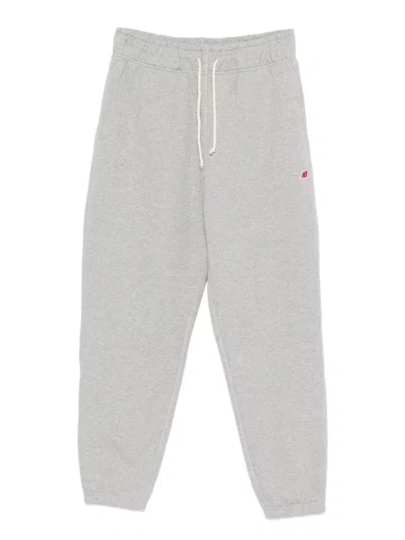 Sportske hlače New Balance s autogramom siva