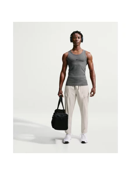 Długie spodnie Nike Unlimited Cargo Dri-FIT beżowy S białe