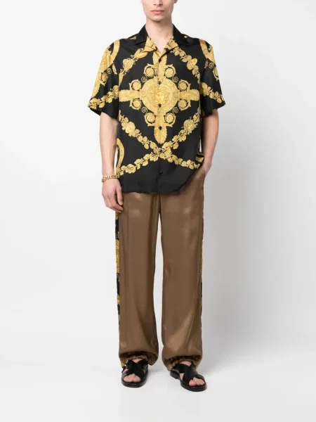 Raštuotos plačiakojis kelnės Versace ruda
