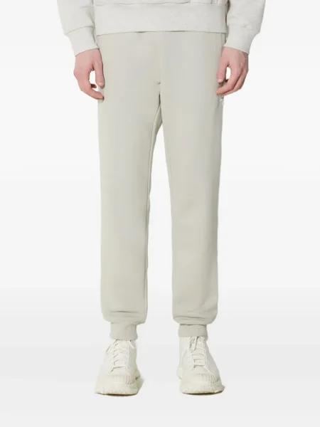 Pruhované klasické kalhoty Adidas zelené