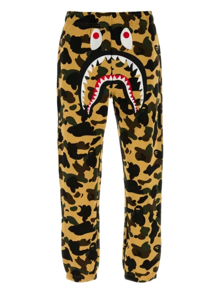 Pantaloni A Bathing Ape® cu model camuflaj galben