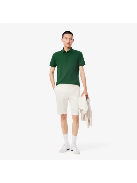 Сhinosy Lacoste białe
