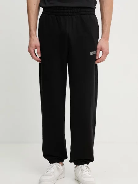 Calvin Klein Pantaloni de trening TERRY negru