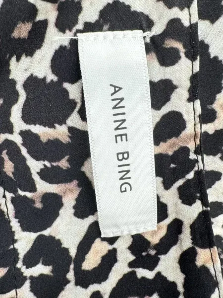 Top Anine Bing cu model leopard din dantelă
