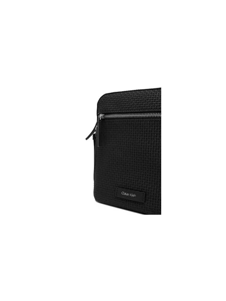Torbica za okrog pasu Calvin Klein Embossed Woven Reporter črna