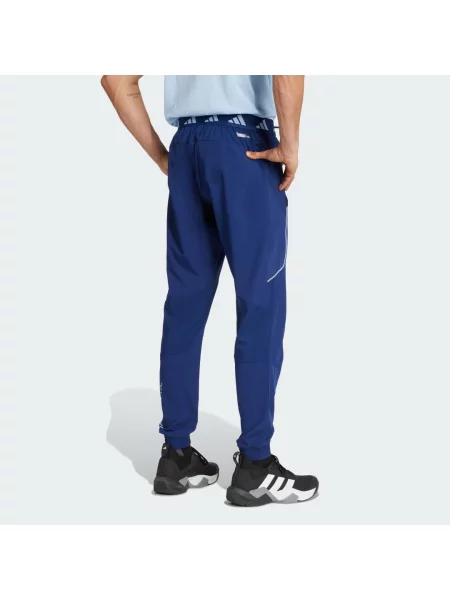 Długie spodnie adidas Tech Apparel ciemny XS niebieski