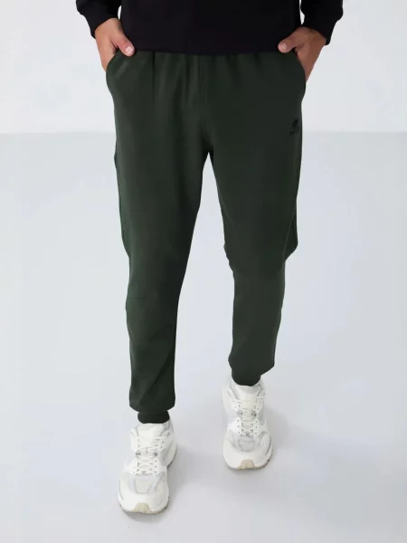 Tommy Life Športne hlače Jogginghose temno zelena