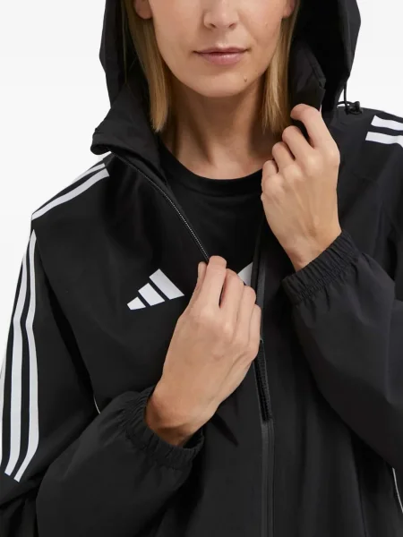Geacă cu puf Adidas din piele de căprioară cu dungi cu glugă albastru