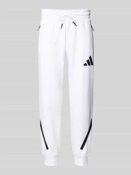 Spodnie dresowe z elastycznym pasem Adidas Sportswear biały