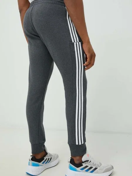 Csíkos frottír melegítőnadrág Adidas szürke