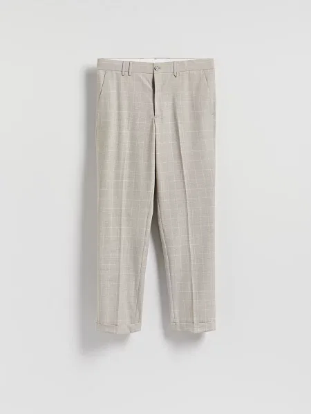 Клетчатые брюки Reserved бежевые