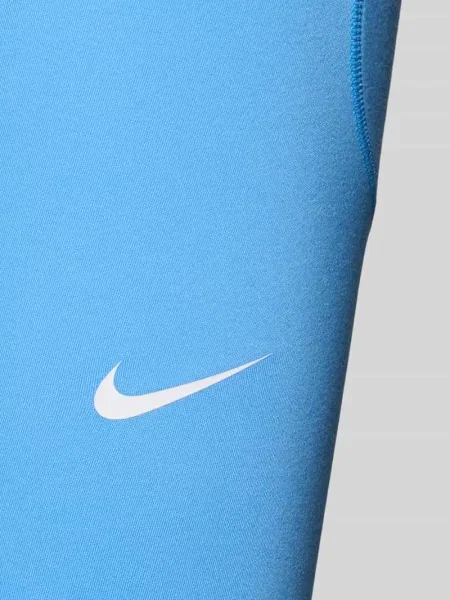 Legginsy z logo i elastycznym pasem Nike Training niebieskie
