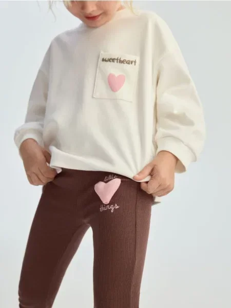 Reserved legginsy z aplikacją brązowy