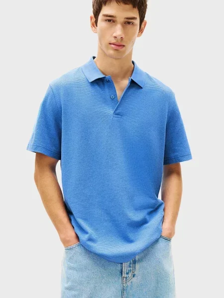 Поло Tommy Jeans голубое