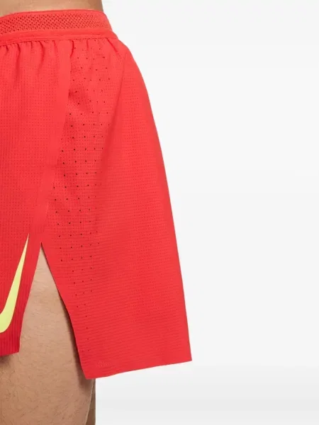 Krátké fleecové kraťasy Nike s potiskem žluté