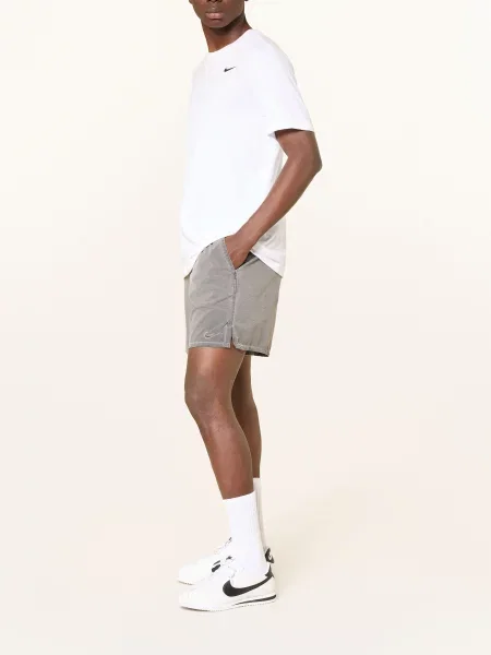 Nike Tréninkové Šortky Unlimited N.A.C. šedá