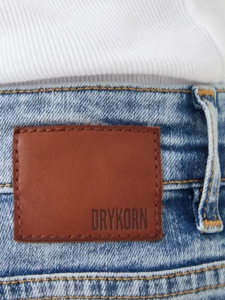 Liesas skinny fit džinsai Drykorn su nubrozdinimais mėlyna