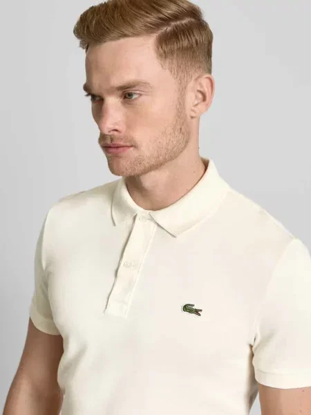 Koszulka polo o kroju slim fit z naszywką z logo model ‘PIQUE’ Lacoste białe
