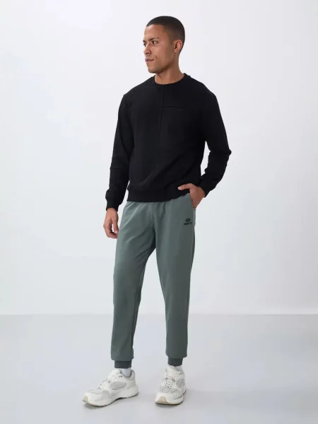 Tommy Life Športne hlače Jogginghose pastelno zelena