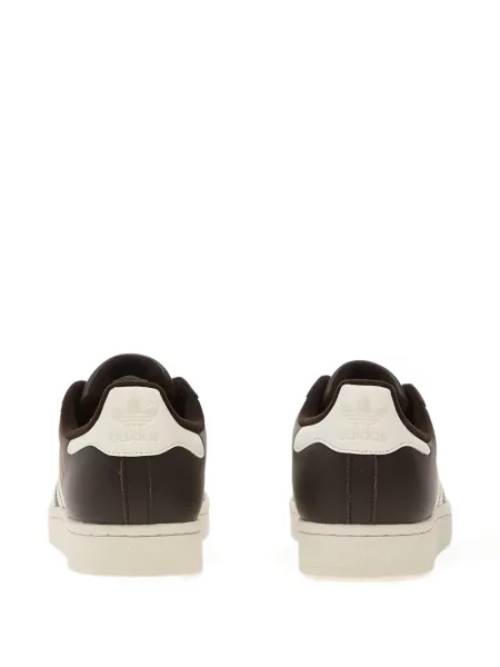 Pantaloni palazzo Adidas cu dungi cu decolteu în V negru