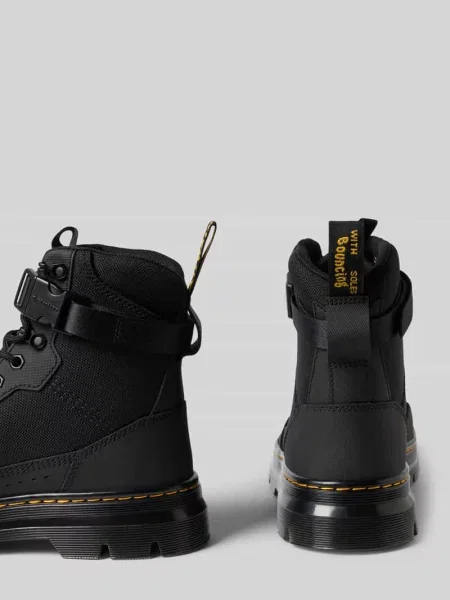 Kozaki z mieszanki skóry z regulowaną sprzączką Dr. Martens czarne