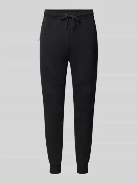 Spodnie dresowe o kroju slim fit z mieszanki bawełny Nike czarne