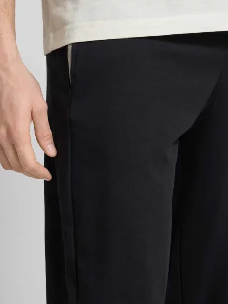 Spodnie dresowe z detalami z logo Christian Berg Men czarny