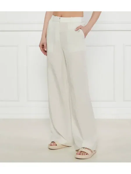 Calvin Klein Nadrág | flare fit len hozzáadásával bézs