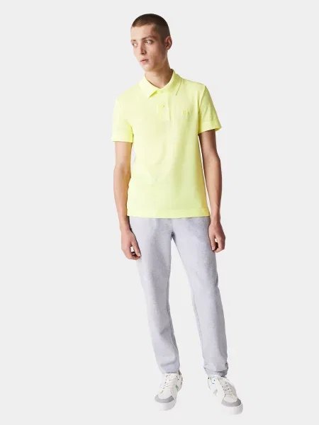 Поло Lacoste желтое