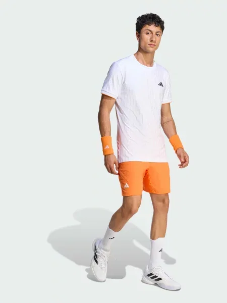 Переработанный спортивные шорты Adidas оранжевые