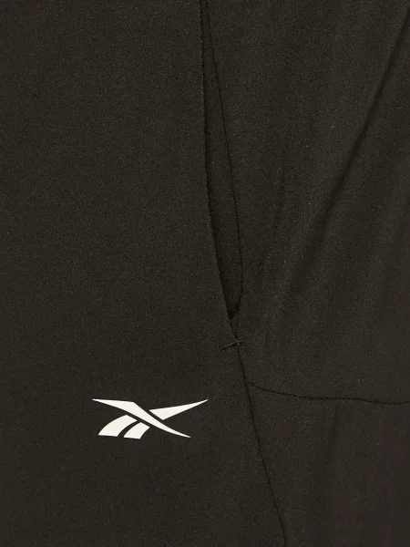 Reebok Spodnie Mężczyzna S Spodnie Treningowe Tkane czarny
