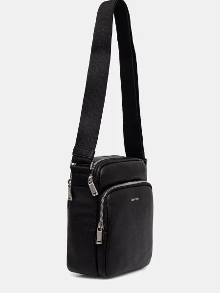 Geantă crossover Calvin Klein Raised Pocket Reporter negru