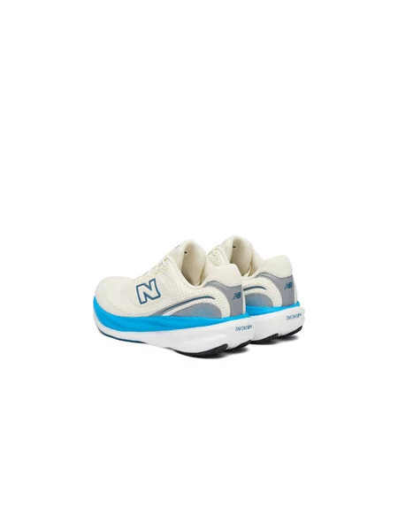 Bėgimo batai New Balance Infinion Kreminė