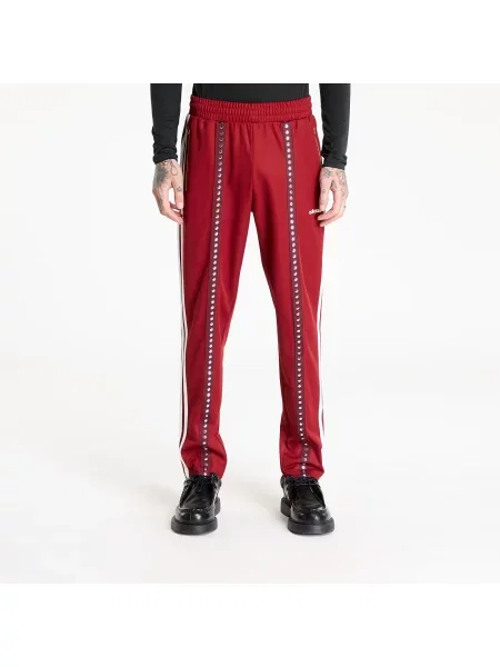 Tepláky adidas Originals s aplikací vínová