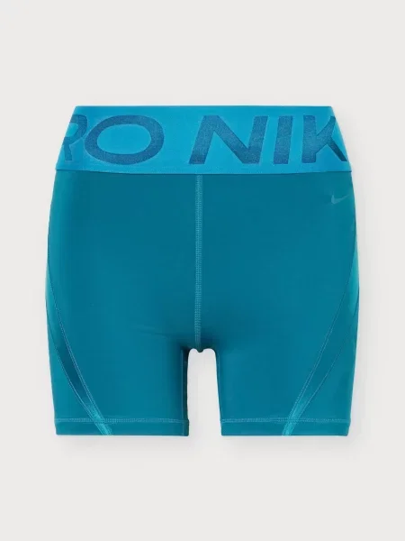 NIKE Športové nohavice NP petrolejová