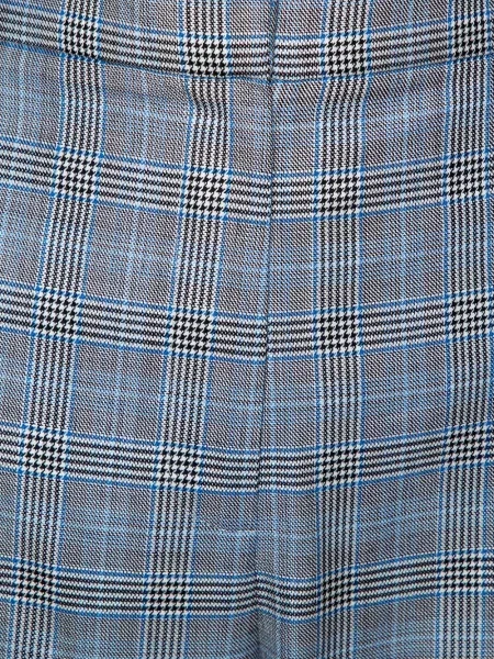 Pantaloni Tibi în carouri gri