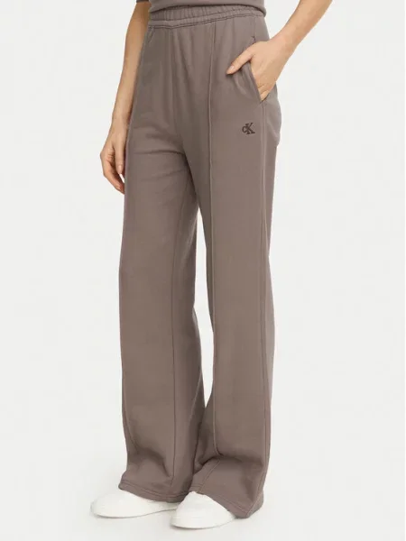 Calvin Klein Jeans Pantaloni trening Monogram închis Flare Fit bej